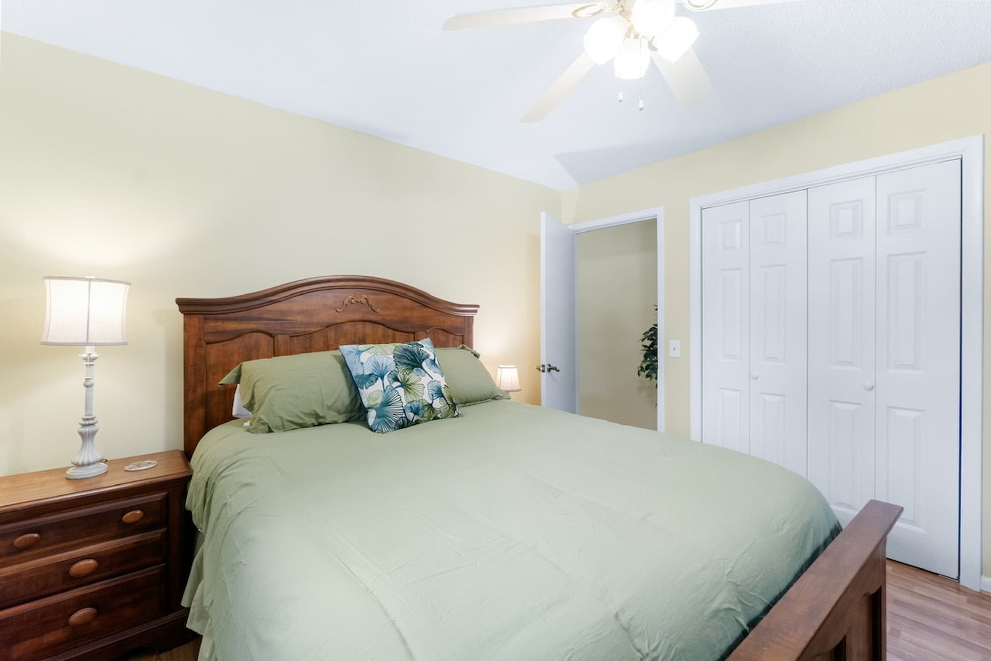 Queen bedroom in soft sage green