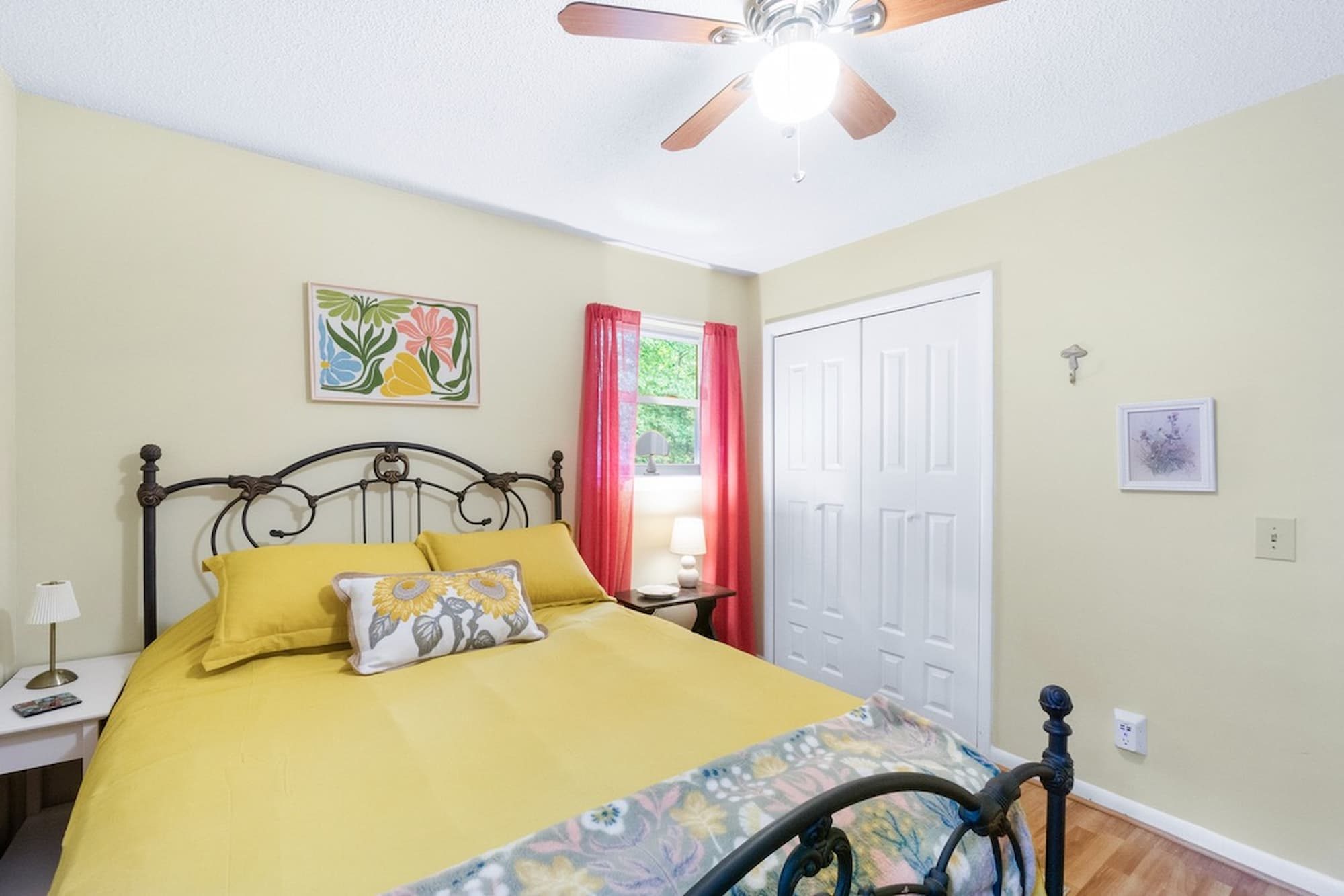 Sunny queen bedroom with sunflower accents