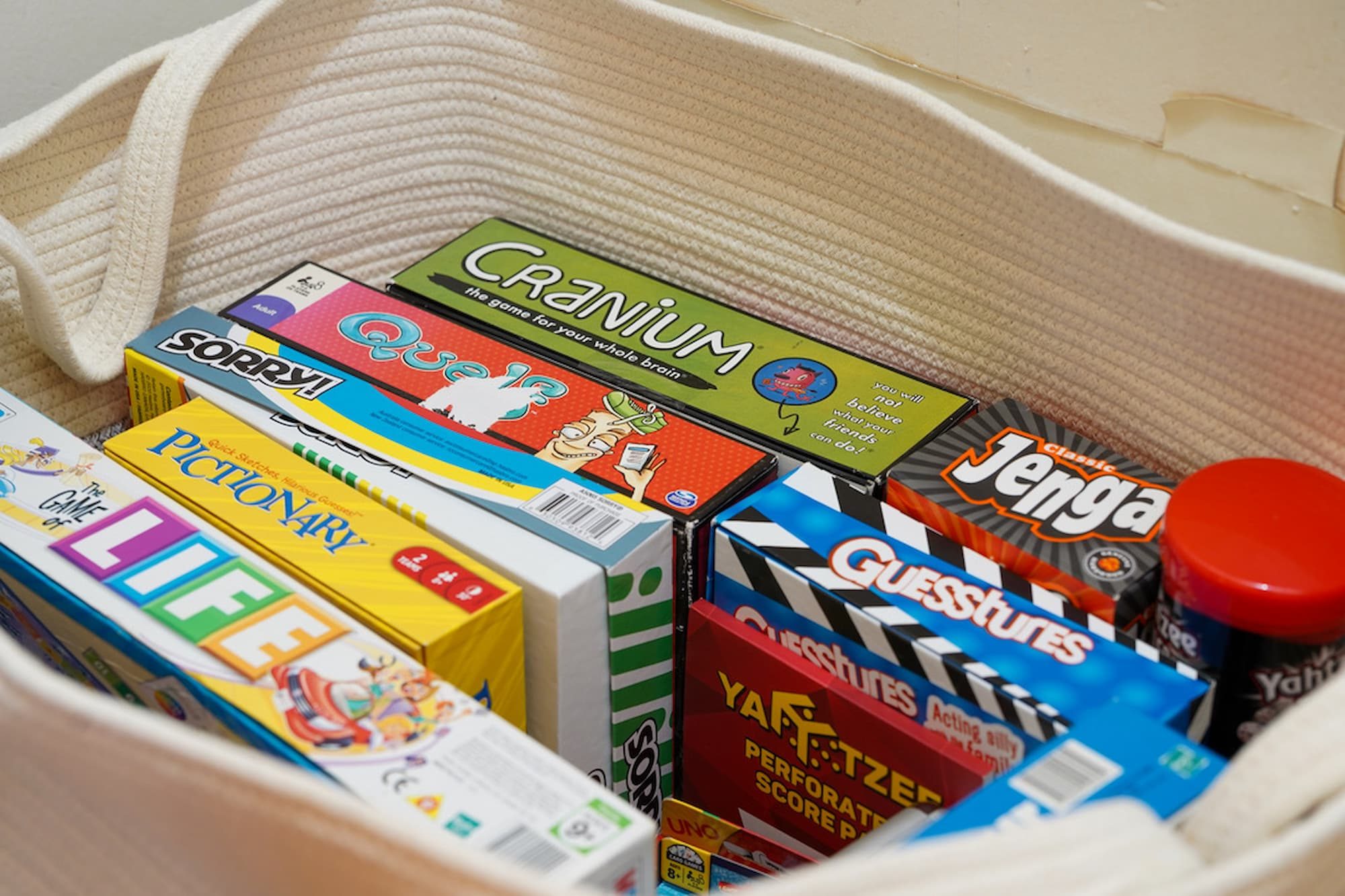 Basket full of family board games