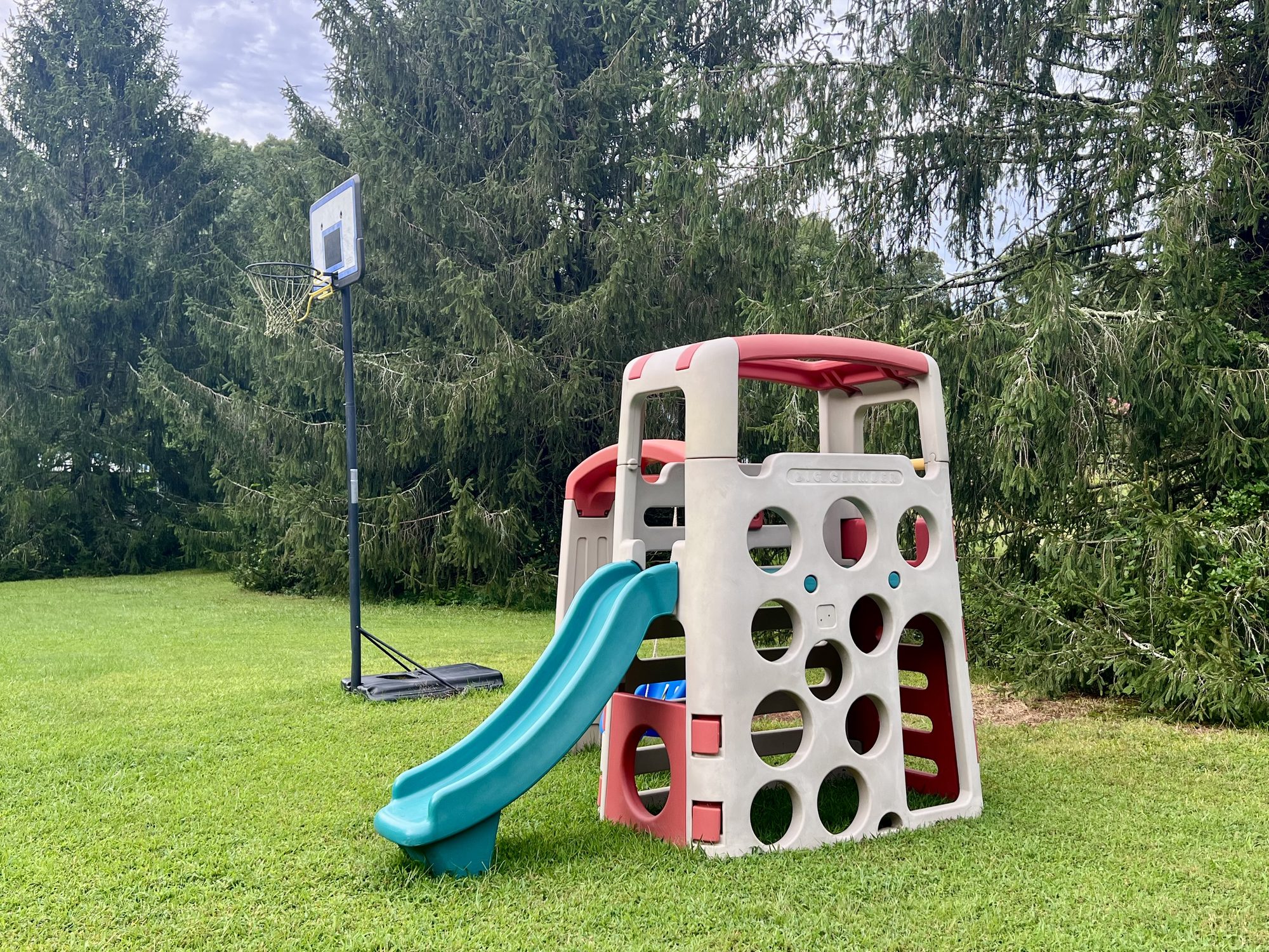 Toddler playhouse with climber and slide