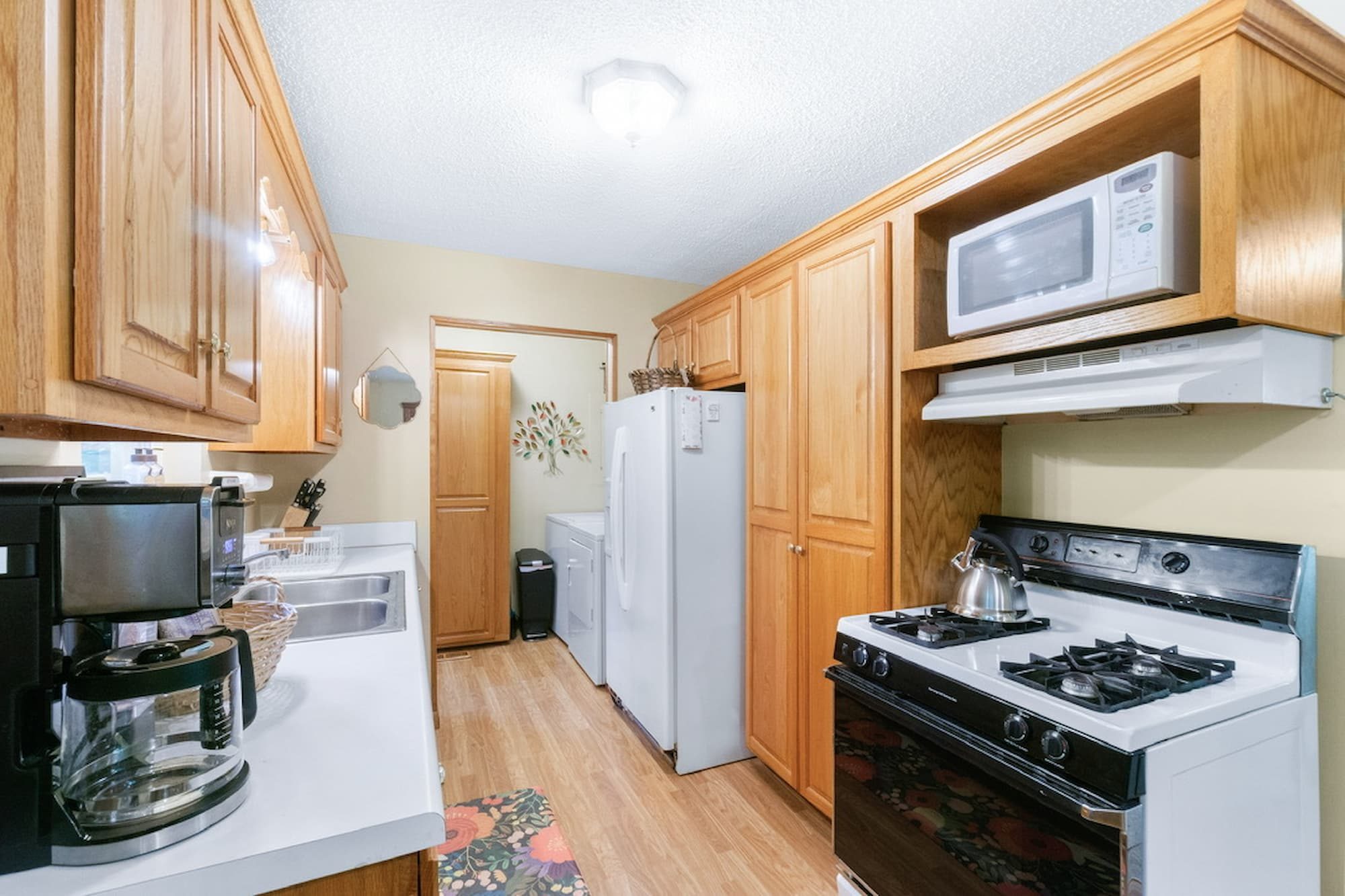 Fully equipped kitchen with gas range and coffee maker